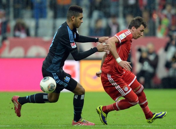  拜仁慕尼黑提前锁定半程冠军，德甲统治力彰显无遗  